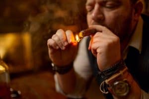 portrait-of-bearded-man-lights-cigar-with-a-match-2024-11-27-22-09-12-utc-1-300x199 Best Blunt Wraps: What Works Best for You